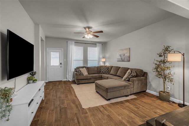 411 Skipper Ln, Azle, TX 76020 - living area featuring a ceiling fan, dark wood-style floors, and baseboards