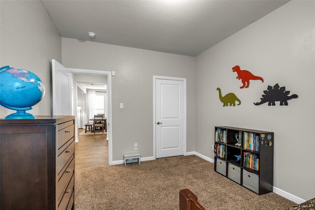 411 Skipper Ln, Azle, TX 76020 - bedroom with carpet flooring and baseboards