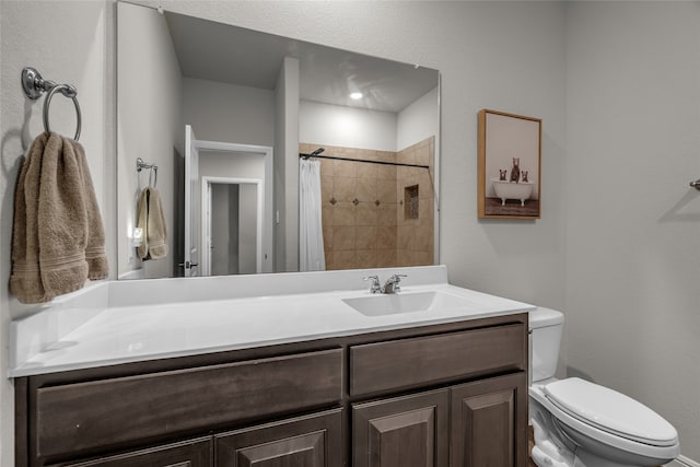 411 Skipper Ln, Azle, TX 76020 - bathroom with toilet, vanity, and tiled shower