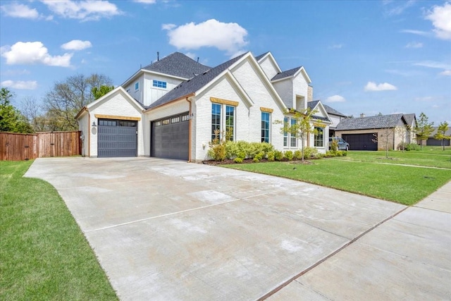 view of front of house featuring a garage, concrete driveway, and brick siding