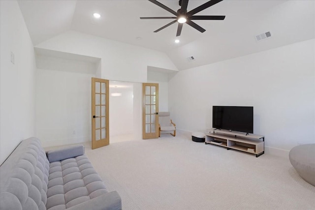 living area with vaulted ceiling, french doors, ceiling fan, carpet, and recessed lighting