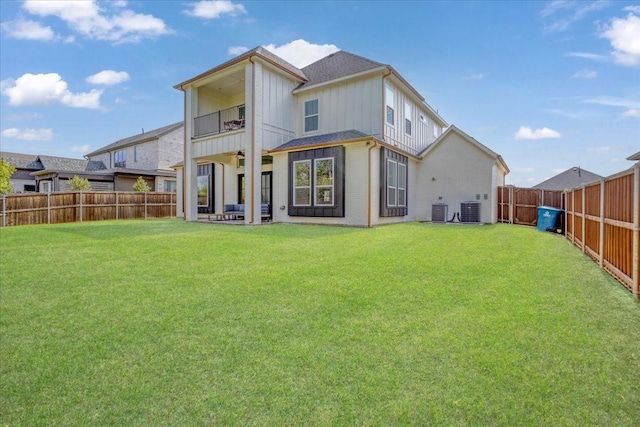 rear view of property featuring a balcony, board and batten siding, central air condition unit, and a shingled roof