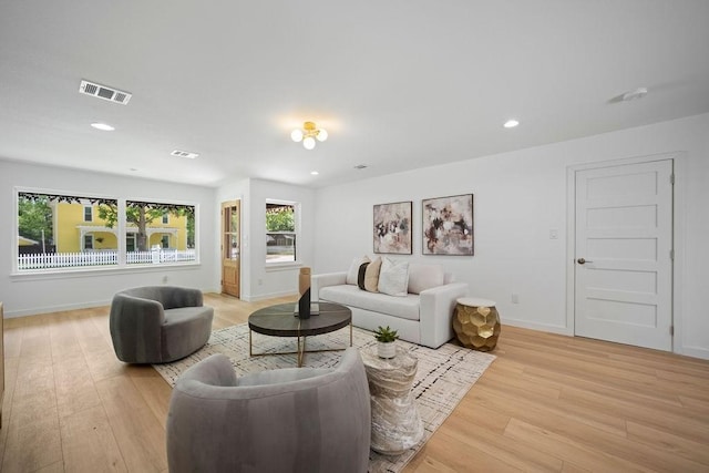 1500 W Virginia St, Mckinney, TX 75069 - living area with light wood-type flooring, baseboards, and recessed lighting
