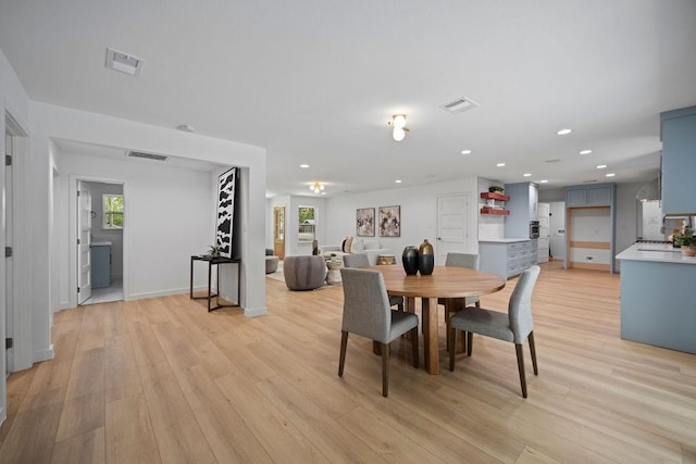 1500 W Virginia St, Mckinney, TX 75069 - dining space featuring light wood-type flooring, recessed lighting, and baseboards
