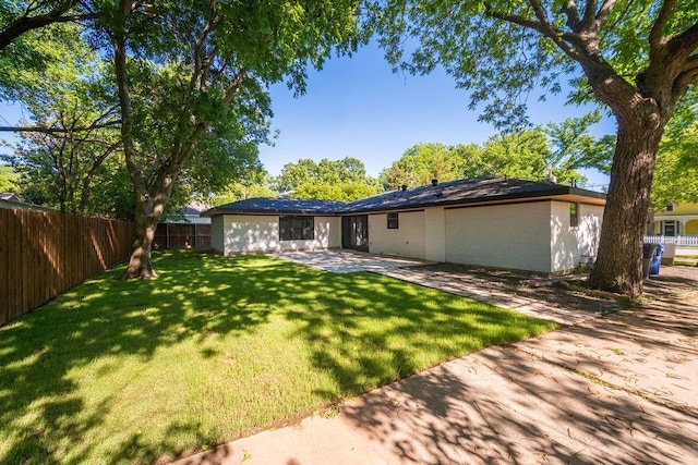 1500 W Virginia St, Mckinney, TX 75069 - rear view of property with a patio