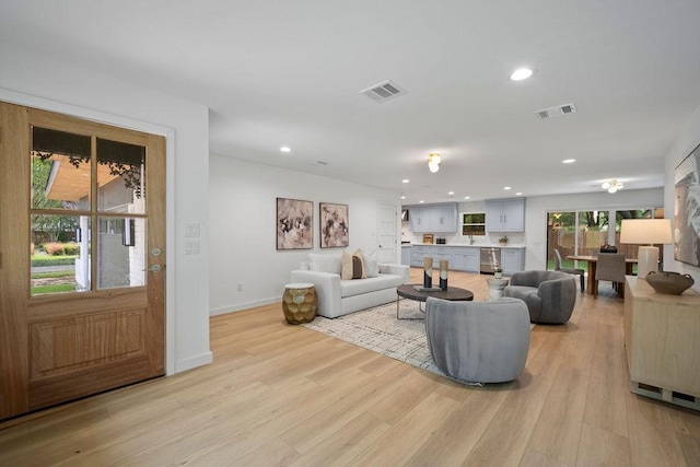 1500 W Virginia St, Mckinney, TX 75069 - living area featuring recessed lighting, light wood-type flooring, and baseboards