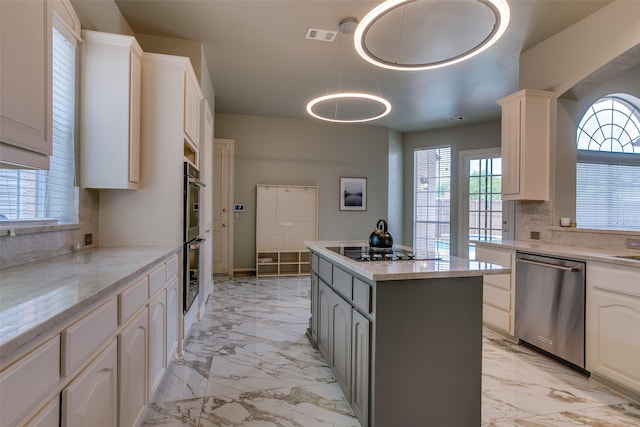 6513 Crawley Dr, Plano, TX 75093 - kitchen with stainless steel appliances, light marble finish flooring, a kitchen island, tasteful backsplash, and hanging light fixtures