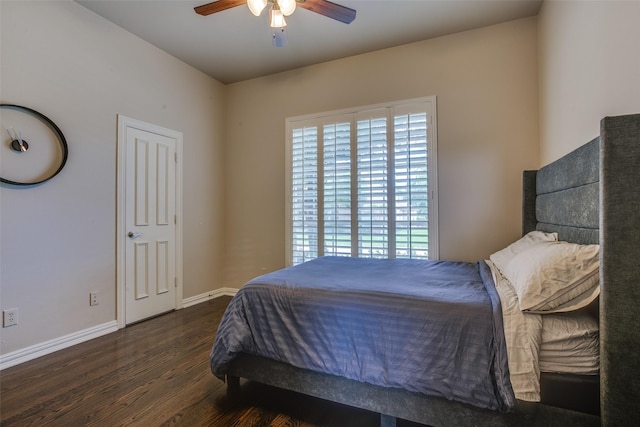 6513 Crawley Dr, Plano, TX 75093 - bedroom with wood finished floors, baseboards, and a ceiling fan