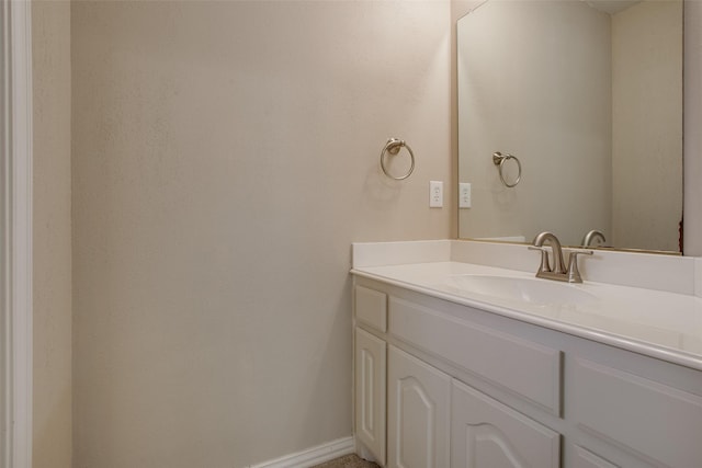 6513 Crawley Dr, Plano, TX 75093 - bathroom featuring vanity and baseboards