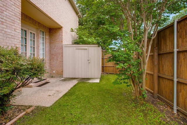 6513 Crawley Dr, Plano, TX 75093 - view of yard featuring a storage shed and an outbuilding