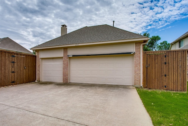 6513 Crawley Dr, Plano, TX 75093 - garage with driveway and a gate