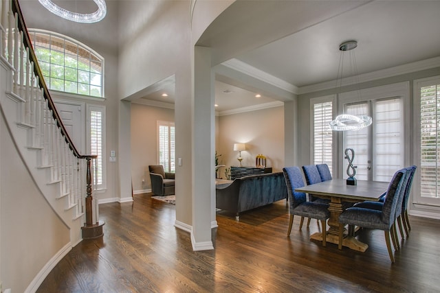 6513 Crawley Dr, Plano, TX 75093 - dining space with a chandelier, stairway, healthy amount of natural light, and crown molding