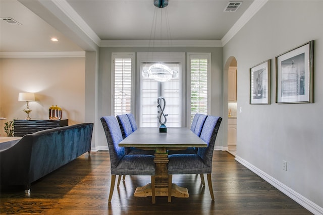 6513 Crawley Dr, Plano, TX 75093 - dining space with arched walkways, baseboards, dark wood-style floors, and ornamental molding