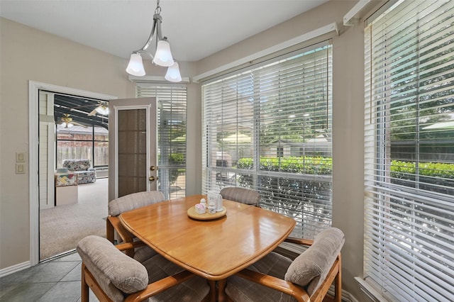 dining area featuring a sunroom