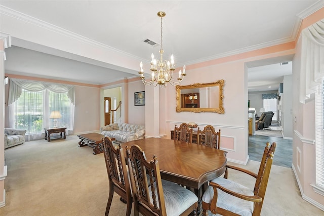 dining space with light carpet, a chandelier, and crown molding