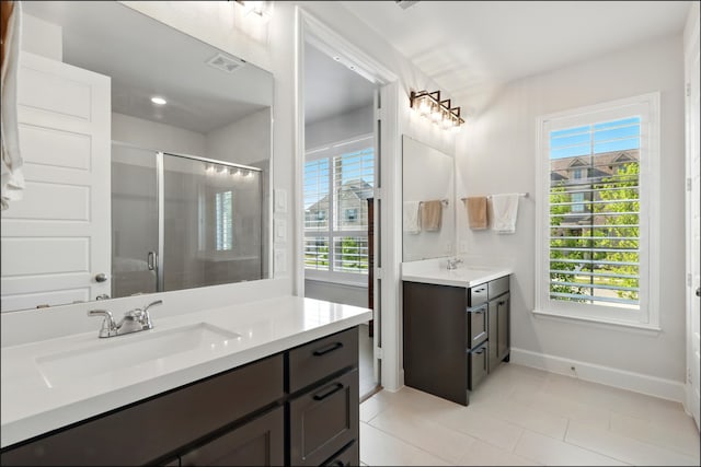 8529 Melrose, The Colony, TX 75056 - full bath with a stall shower, tile patterned floors, baseboards, and vanity