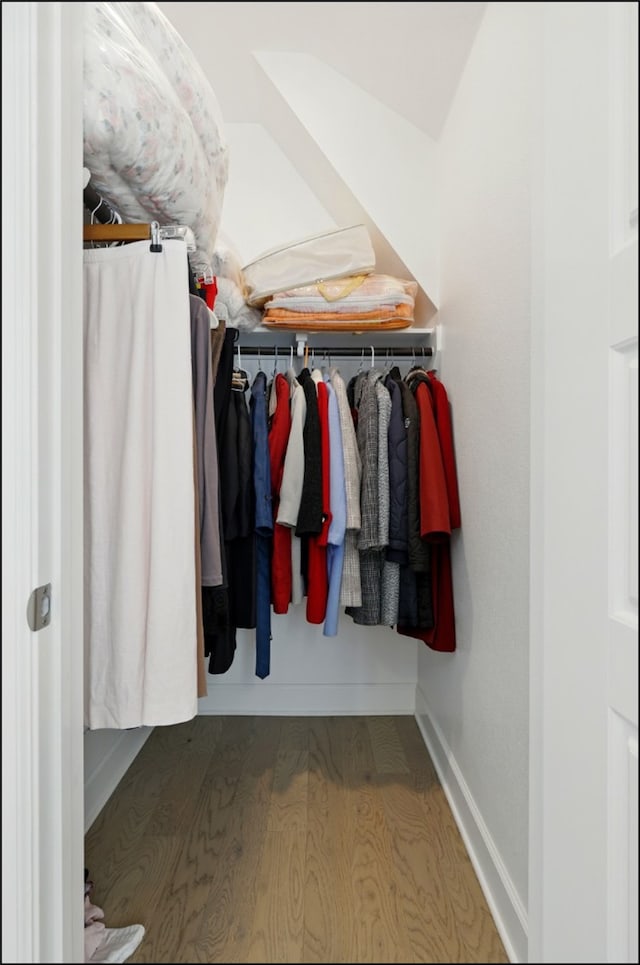 8529 Melrose, The Colony, TX 75056 - walk in closet featuring wood finished floors