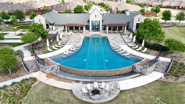 8529 Melrose, The Colony, TX 75056 - community pool featuring a residential view and a pergola