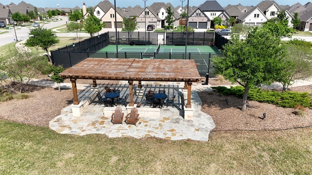 8529 Melrose, The Colony, TX 75056 - view of home's community with a residential view, a tennis court, and a pergola