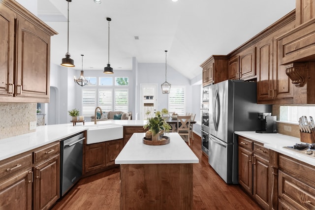 700 Renault Way, Mckinney, TX 75071 - kitchen with stainless steel appliances, dark wood-style floors, light countertops, tasteful backsplash, and a sink
