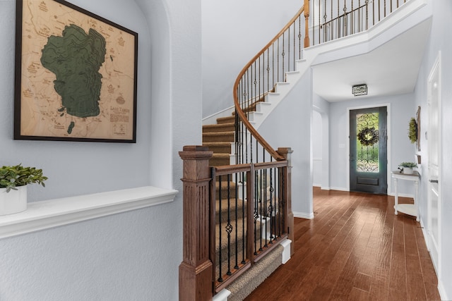 700 Renault Way, Mckinney, TX 75071 - entryway featuring wood finished floors, stairway, and baseboards