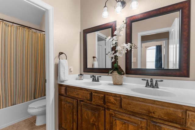 700 Renault Way, Mckinney, TX 75071 - bathroom with double vanity, toilet, tile patterned flooring, and shower / bath combination with curtain