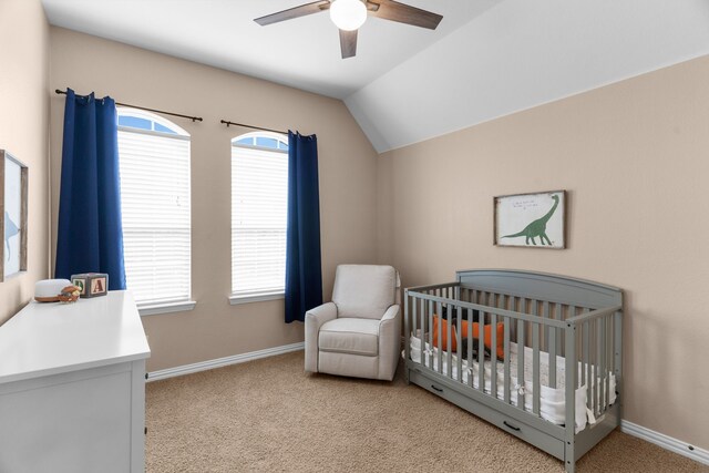700 Renault Way, Mckinney, TX 75071 - carpeted bedroom featuring baseboards, lofted ceiling, a nursery area, and a ceiling fan
