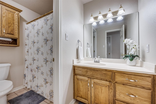 4942 US Highway 69, Denison, TX 75021 - full bathroom featuring toilet, tile patterned floors, vanity, and a shower with curtain
