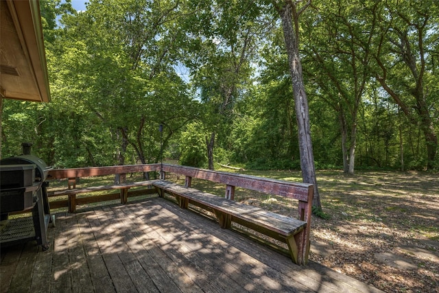 4942 US Highway 69, Denison, TX 75021 - wooden deck featuring a wooded view
