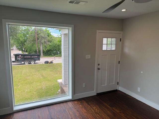 foyer featuring baseboards, dark wood finished floors, a ceiling fan, and recessed lighting