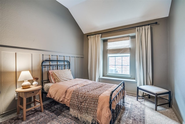 6520 Creek Crossing Ln, Sachse, TX 75048 - carpeted bedroom featuring vaulted ceiling and wainscoting