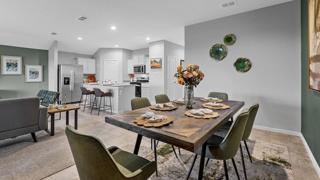 1612 Cansler Dr, Denton, TX 76249 - dining space featuring baseboards, recessed lighting, and light tile patterned flooring