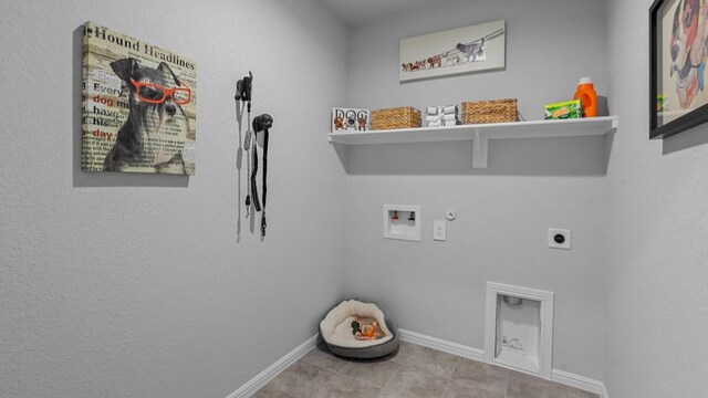 1612 Cansler Dr, Denton, TX 76249 - laundry area featuring hookup for a gas dryer, electric dryer hookup, washer hookup, baseboards, and tile patterned flooring