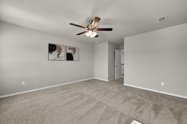 2867 Baneberry Ln, Mesquite, TX 75150 - spare room with ceiling fan, carpet flooring, and baseboards