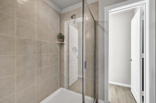 2867 Baneberry Ln, Mesquite, TX 75150 - bathroom featuring a shower stall and baseboards