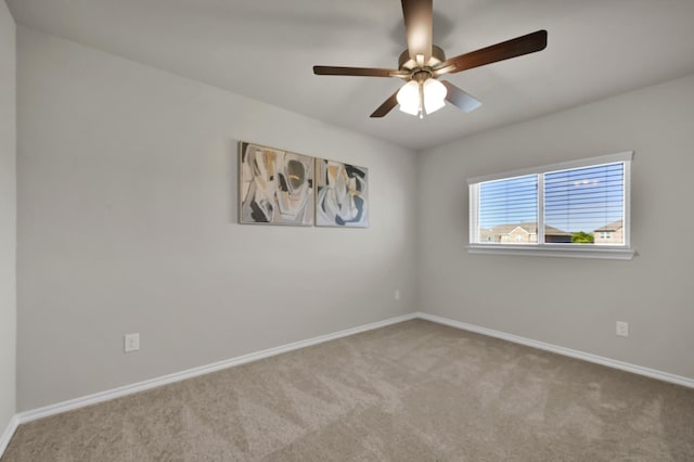 2867 Baneberry Ln, Mesquite, TX 75150 - carpeted spare room featuring a ceiling fan and baseboards