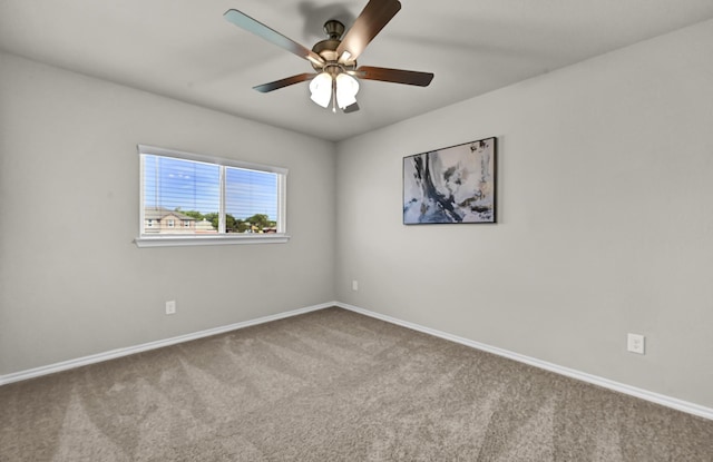 2867 Baneberry Ln, Mesquite, TX 75150 - carpeted spare room with baseboards and ceiling fan