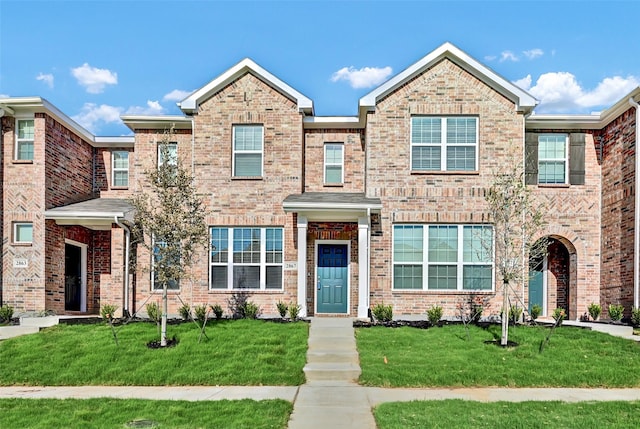 2867 Baneberry Ln, Mesquite, TX 75150 - multi unit property featuring a front yard and brick siding