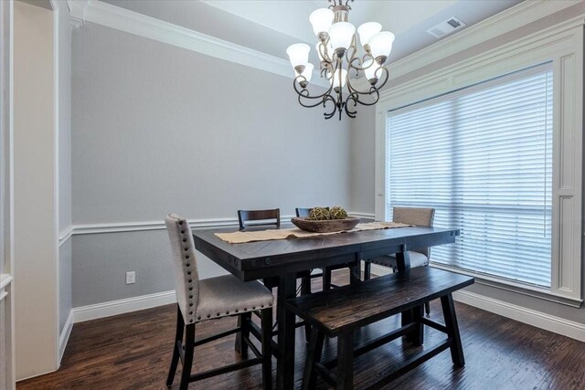 living room with a ceiling fan, baseboards, ornamental molding, dark wood finished floors, and a chandelier