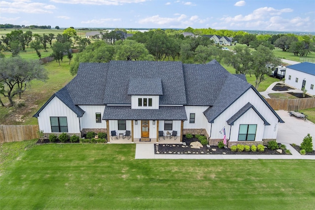 260 Greene Rd, Weatherford, TX 76087 - rear view of property with a shingled roof and board and batten siding