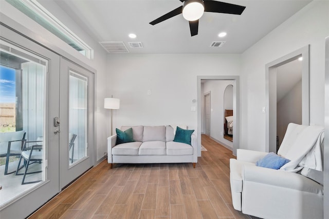 260 Greene Rd, Weatherford, TX 76087 - living room with french doors, ceiling fan, and light wood-style flooring