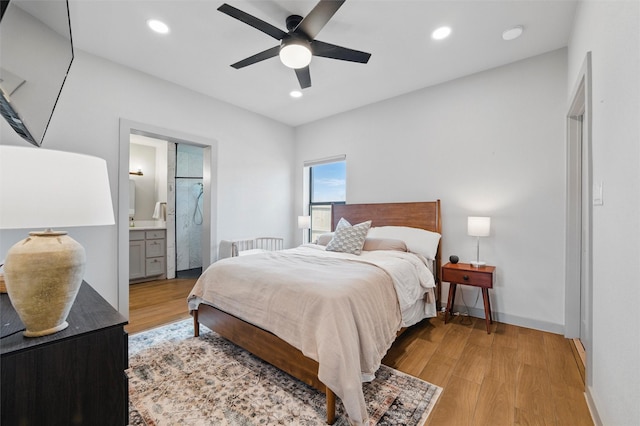 260 Greene Rd, Weatherford, TX 76087 - bedroom featuring light wood finished floors, recessed lighting, baseboards, a ceiling fan, and ensuite bath