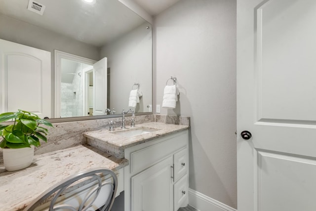 5 Maltese Cir, Heath, TX 75032 - bathroom featuring vanity, a shower, and baseboards