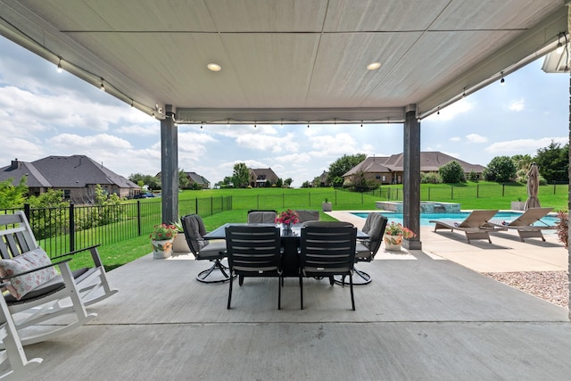 5 Maltese Cir, Heath, TX 75032 - view of patio / terrace featuring outdoor dining area, a pool with connected hot tub, and a residential view