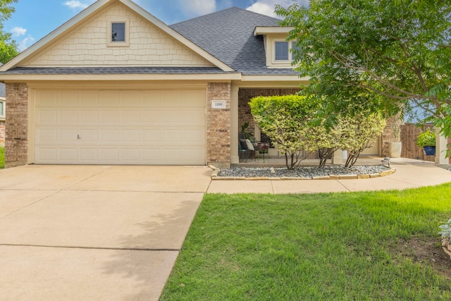 1100 Thicket Dr, Mansfield, TX 76063 - view of front of home with brick siding, a shingled roof, concrete driveway, and a garage