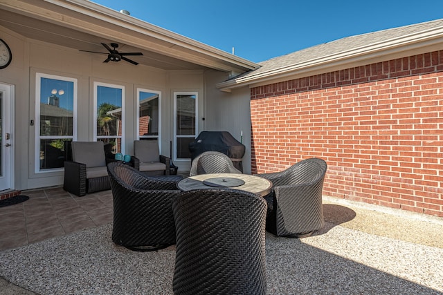 view of patio / terrace featuring a ceiling fan