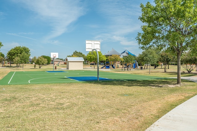 view of sport court featuring a yard and community basketball court