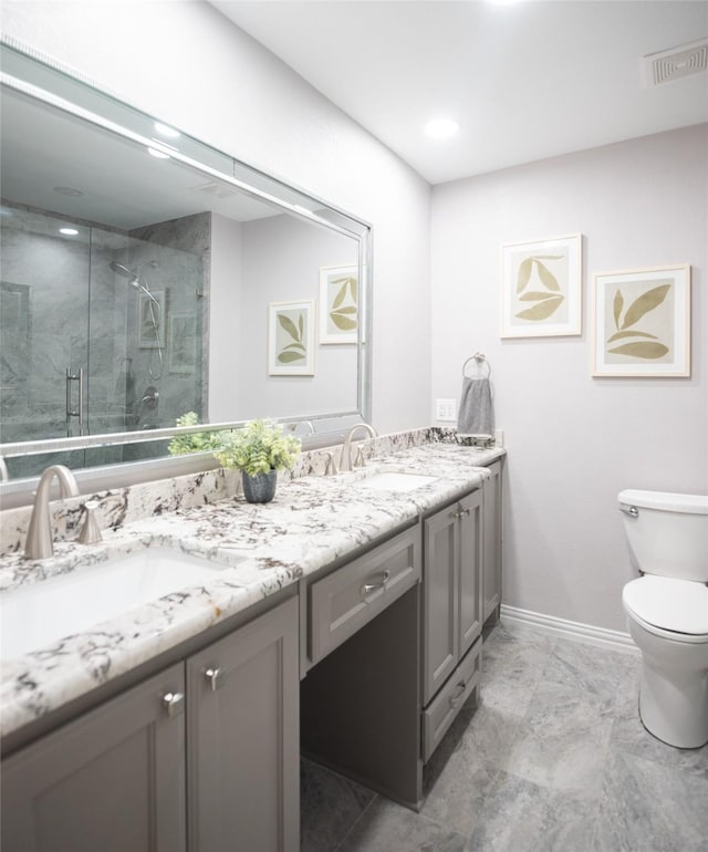 102 Camino Real W, Wylie, TX 75098 - full bath with toilet, double vanity, a marble finish shower, and baseboards