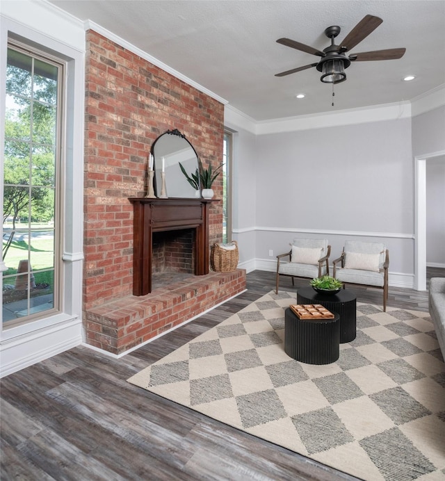 102 Camino Real W, Wylie, TX 75098 - living area featuring ornamental molding, a ceiling fan, baseboards, wood finished floors, and recessed lighting