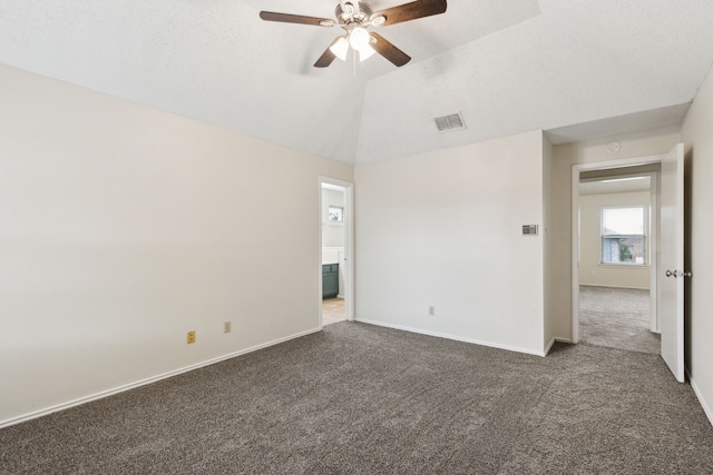3516 Napolean Ct, Plano, TX 75023 - empty room with dark colored carpet, ceiling fan, baseboards, and lofted ceiling